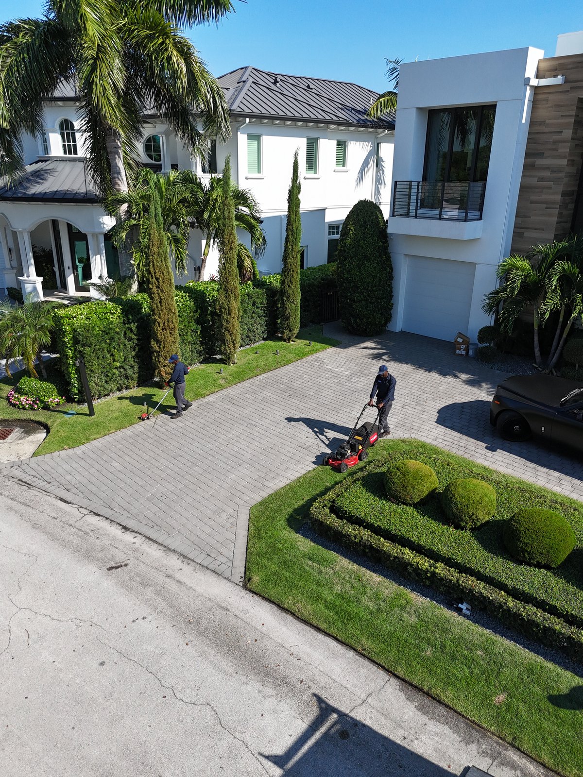 Aerial view of a manicured South Florida estate and grounds