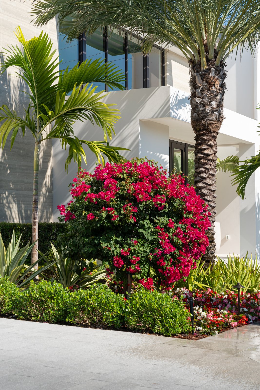 Newly installed landscape beds and plant material at an estate